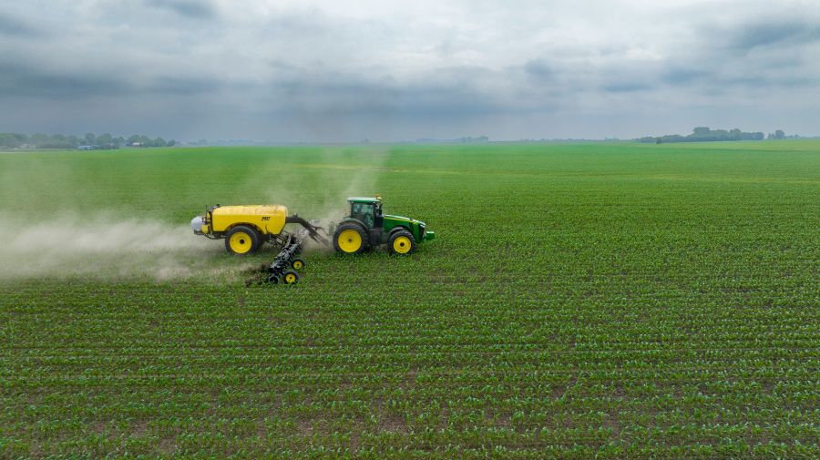 fertilizer Sidedressing nitrogen on 24 rows of corn in one pass.