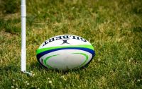 rugby a rugby ball near a corner flag 