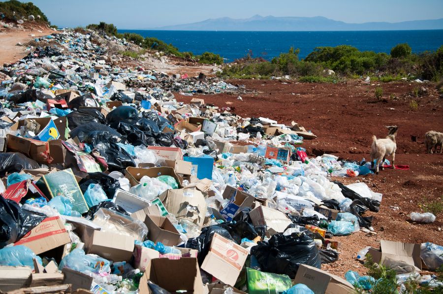 Pollution Mountain of rubbish and garbage on the beach by the sea 