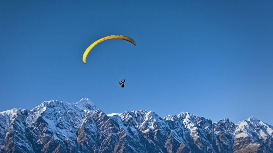 paragliding paraglider Soaring paraglider paragliding,blue,mountain ridge