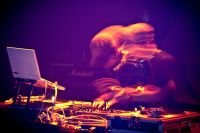 Electronic music Electronic music performer, blurred to capture the motion. dj,musician,electronic