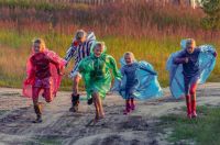 Weather forecast Children in colorful raincoats running laughing along the footpath moscow,россия,raincoat