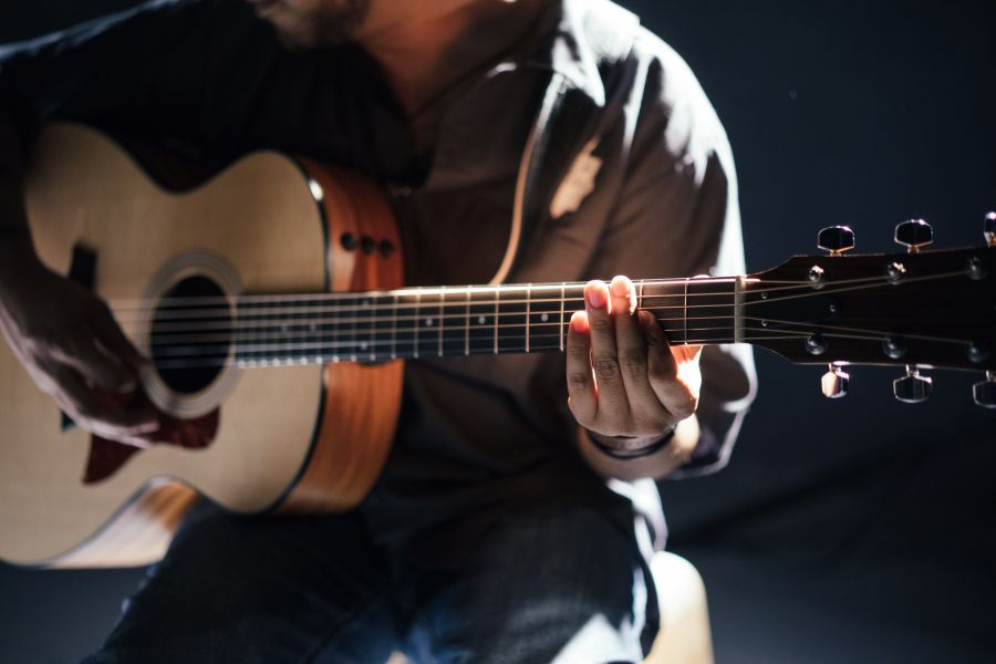 Music festival Acoustic guitar player in pale light music,guitar,person