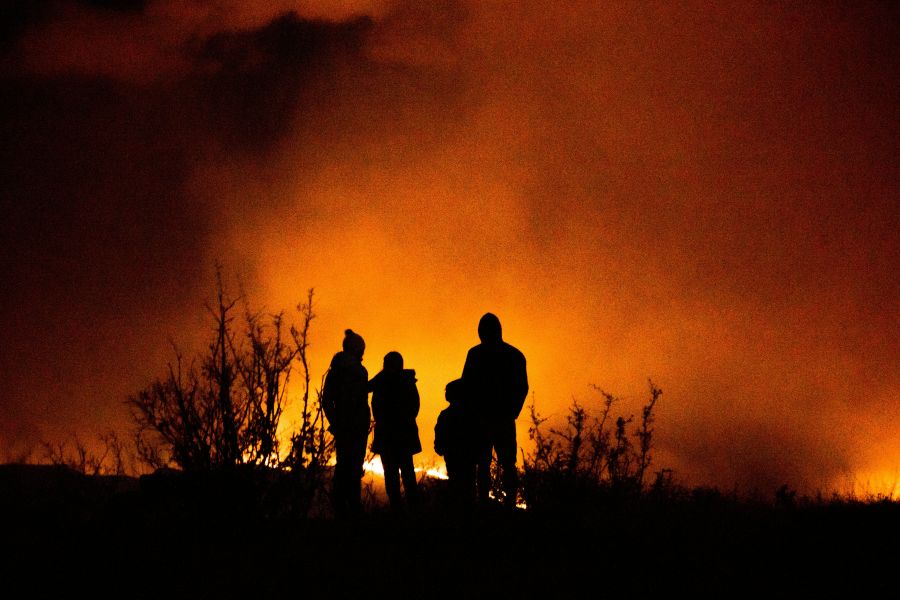 Wildfire Evacuation Family watching a wildfire in the distance in the summer of 2020. 
