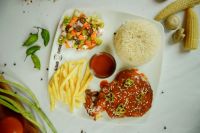Firefighters meal A vibrant platter featuring glazed chicken, golden fries, rice, and fresh salad, beautifully captured 