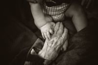 Elderly seniors I love this photo of my mums hand reaching out to share a moment with her great grandson.  Even when we can’t understand each other in language, we can all understand what a simple touch means. age,people,grandma