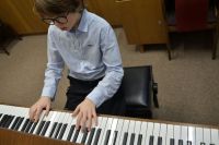 Conservatory Music Adam preparing for his piano exam piano,grey,exam