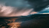 rainstorm Approaching rainstorm over a mountain landscape 