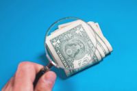 investigation funds money in the hand .. 