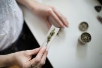 cannabis Woman make cannabis joint 
