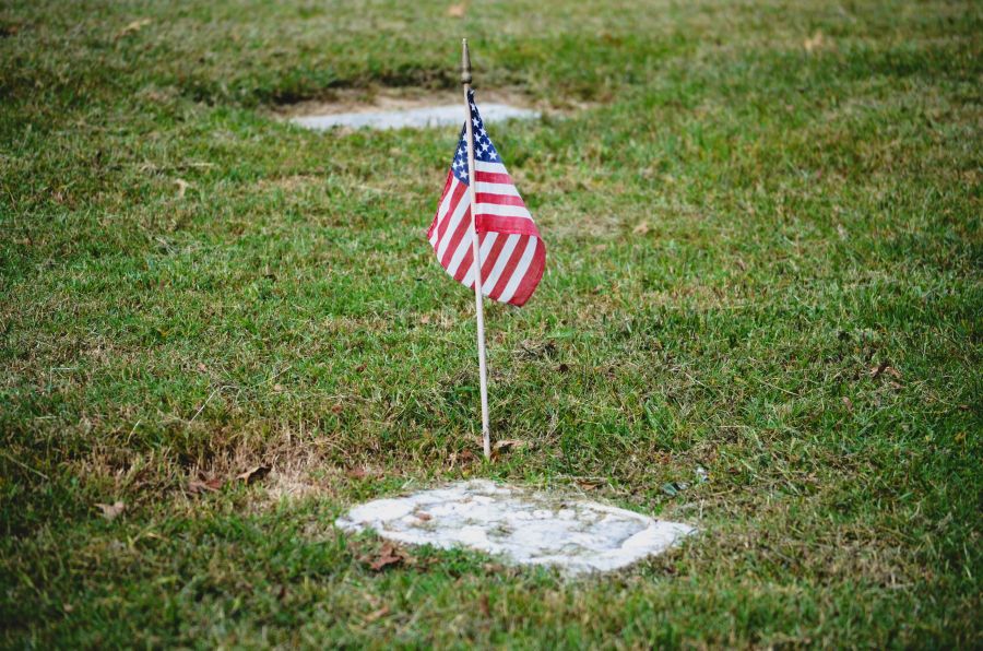 honor American flag on military grave marker 