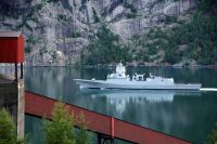 Navy Frigate Norwegian frigate HNoMS Helge Ingstad F313 in Sørfjord (June 2018). This ship sunk 5 months later after a collision with an oil tanker. Parts of a mining company on the left side and at the bottom of the photo.

A symbol of military power and its transience. tyssedal,norwegen,navy