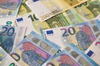 Local currency A pile of Euro (EUR) banknotes that include 20, 100, and 200 notes. (Part II) 