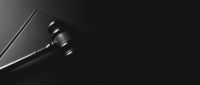 Courtroom Justice justice concept. gavel and law on table, black background 