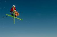 Ski Equipment A skier in the air, somewhere in the Austrian Alps. 