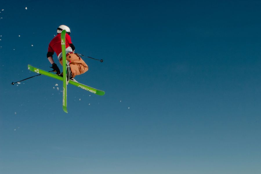 Ski Equipment A skier in the air, somewhere in the Austrian Alps. 