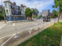 Traffic Safety Flexpost delineators prevent cars from parking on the curbside of R Street NE's unit block in Washington, D.C. These no-parking zones increase the safety of walking and biking by improving the visibility of motorists sharing space with those pedestrians and cyclists. washington,usa,dc 20002