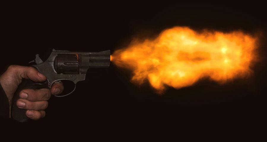 Gunshot Another 9mm blank shot. Not having an acoustic/light trigger, makes me shoot the camera with front curtain flash, thus illuminating the cocked hammer, fraction of a second, before firing. Barely editted photo.
 
