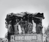 Migrants Daily wage workers on their way to work this image were shot from a moving vehicle. please note that this image from last year not in lockdown days. india,telangana,adilabad