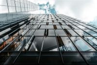 Business center Modern office building with reflection in windows of the building 