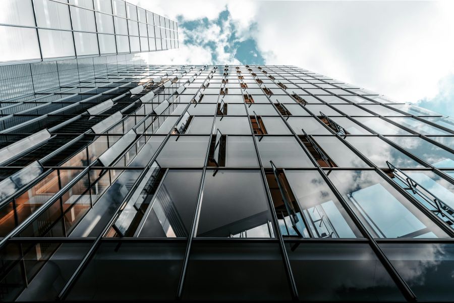 Business center Modern office building with reflection in windows of the building 