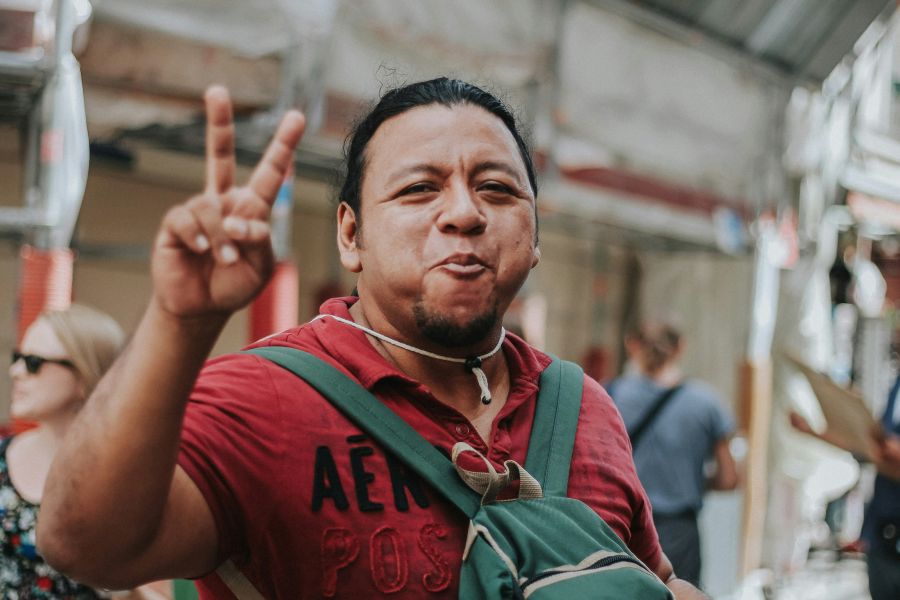 victory A Mexican happily eating a bean burrito in Paris 