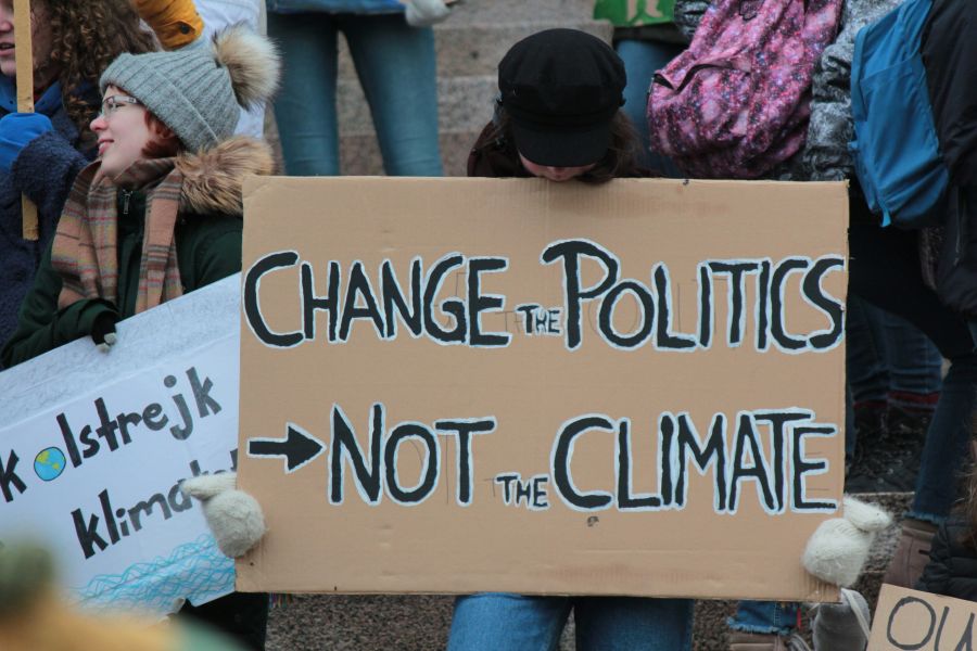 Ecology Protest "Change the politics, not the climate!" A sign made by kids during the Friday's for future climate strike at the Helsinki Parliament in April 2019. 