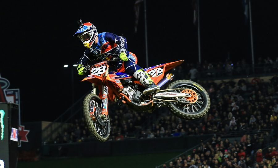 Supercross These lightweight dirt bikes - Supercross bikes - fly high in domed stadiums during the annual Supercross race series. Shane McElrath, here racing his #28 Red Bull KTM, won the season-opening race. 