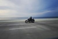 Motorcyclist Biker on a bridge tampa,united states,grey