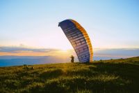 Paraglider Paragliding at sunset le semnoz,sévrier,france