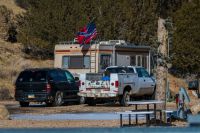 Citizenship Fraternity Mt Carmel, Utah, United States- 01312021: an RVer put a blended Gadsden USA Confederate Flag, Triple Threat Flag on his RV near Zion National Park. 