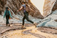 Trail A beautiful and ancient spring fed canyon which weaves its way through 400-meter-tall towers of granite, sandstone and basalt, before plunging into the Gulf of Aqaba | Shiʻb Mūsá – NEOM, Saudi Arabia. saudi arabia,walking,jumping