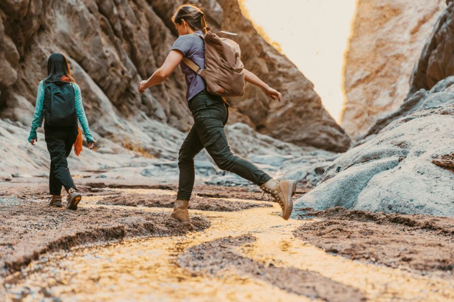 Trail A beautiful and ancient spring fed canyon which weaves its way through 400-meter-tall towers of granite, sandstone and basalt, before plunging into the Gulf of Aqaba | Shiʻb Mūsá – NEOM, Saudi Arabia. saudi arabia,walking,jumping