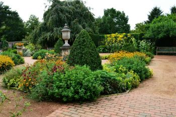 Garden Nature Ornamental botanical garden with gorgeous flowerbeds and landscaped hedges 