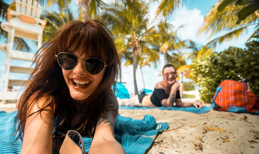 Beach outing excited happy brunette sisters on vacation living their best life on grand turk island because life is a beach 