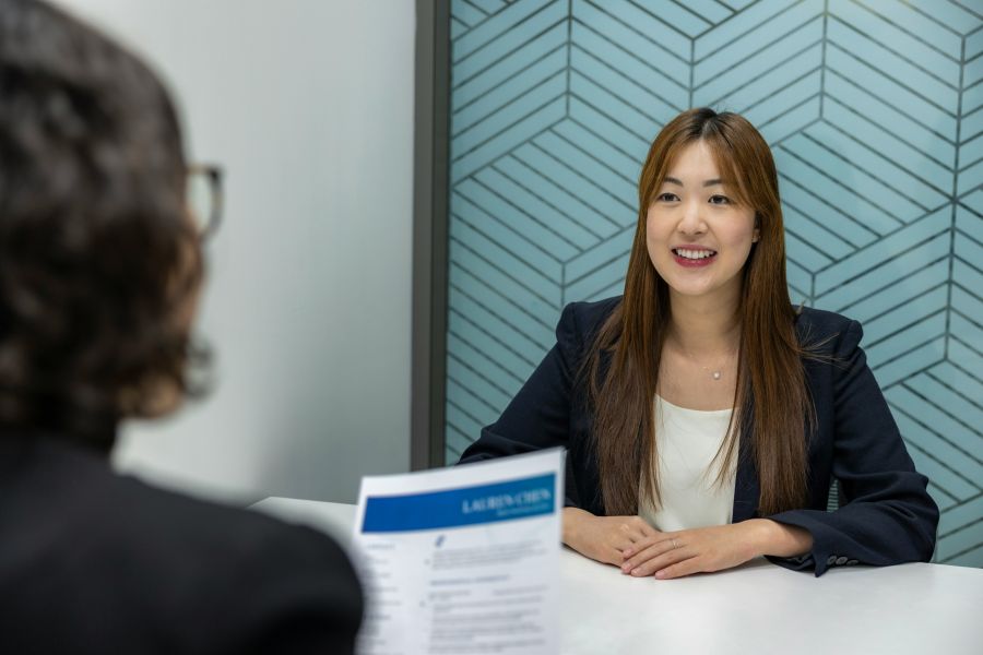 Candidate Confident, Beautiful Asian Woman in suit is smiling during job interview in office environment interview,woman,employment