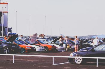 Car gathering people at car show