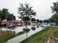 Flooding Prevention Odana road in Madison, wi. We recently got heavy rain with a lot of flooding, this photo speaks for itself on the damage to the city. flooding,car,wisconsin