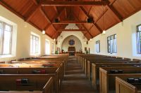 Keywords Church We meet in this stone chapel every year at a conference. The windows stand open allowing the cool morning breeze in. There’s a special feeling being in an old building like this. church,architecture,empty