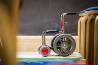 Wheelchair tennis Toy Wheelchair. Toys as well as art and craft materials are available to help pediatric cancer patients cope with their treatment at the NIH Clinical Center. Photographer Daniel Sone wheelchair,cancer,pediatric