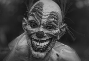 poet clown eyes within the mask derived from the following:

https://unsplash.com/photos/iq8x4Ik8mi8