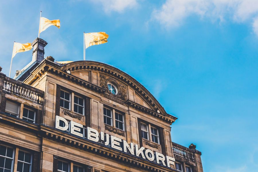 architecture street flags on a top of building in amsterdam building,architecture,blue