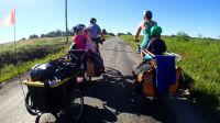 Children s Biking home from an overnight familiy bike camping trip with cargo bikes.  cargo,touring,camping