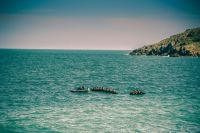 Migrants  grey,sea boat,boats