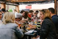 Family event People eating a meal around a table 