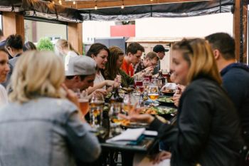 Family event People eating a meal around a table
