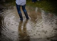 Floods Rain Rainy Day at Music Festival flooding,duck boot,standing