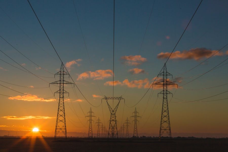 Electricity Power pylons at sunset electricity,energy,power