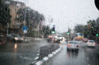 Rainy day Israel rain view to street through rain-specked window israel,grey,vehicle