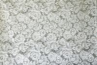 Lace textile White lace like this used to be popular for tablecloths on special occasions. 